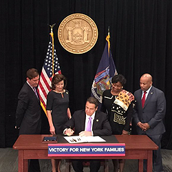 New York Gov. Cuomo Signs $15 Minimum Wage Law