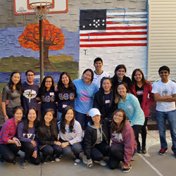 Fraternity Paint A Mural At Knickerbocker